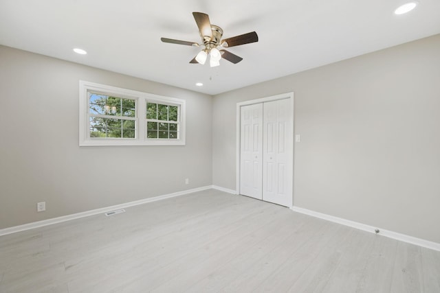 2762 Hunters Point Pike, Lebanon, TN 37087 - unfurnished bedroom with light wood-style flooring, a closet, recessed lighting, and ceiling fan