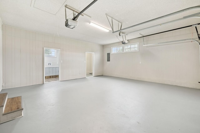 2762 Hunters Point Pike, Lebanon, TN 37087 - garage featuring a garage door opener and electric panel