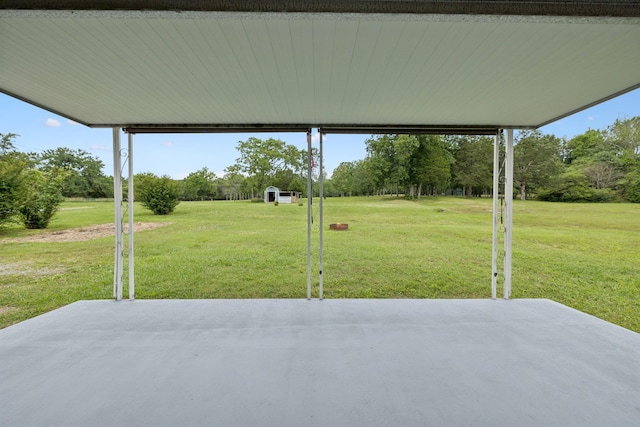2762 Hunters Point Pike, Lebanon, TN 37087 - view of patio featuring a carport and view of scattered trees