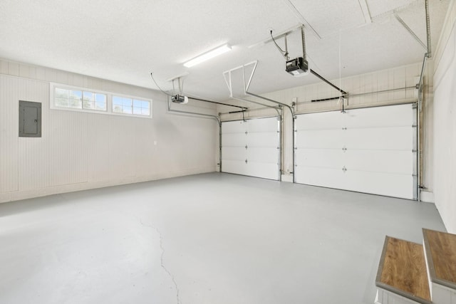 2762 Hunters Point Pike, Lebanon, TN 37087 - garage featuring electric panel and a garage door opener
