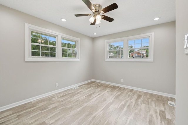 2762 Hunters Point Pike, Lebanon, TN 37087 - spare room featuring healthy amount of natural light, light wood-type flooring, ceiling fan, and recessed lighting