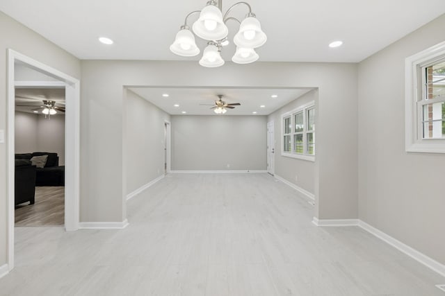 2762 Hunters Point Pike, Lebanon, TN 37087 - unfurnished room featuring a ceiling fan, plenty of natural light, a chandelier, light wood finished floors, and recessed lighting