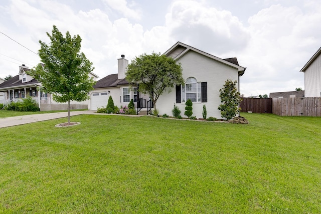 5026 Hectare Ln, La Vergne, TN 37086 - view of front of house with concrete driveway, a chimney, and an attached garage