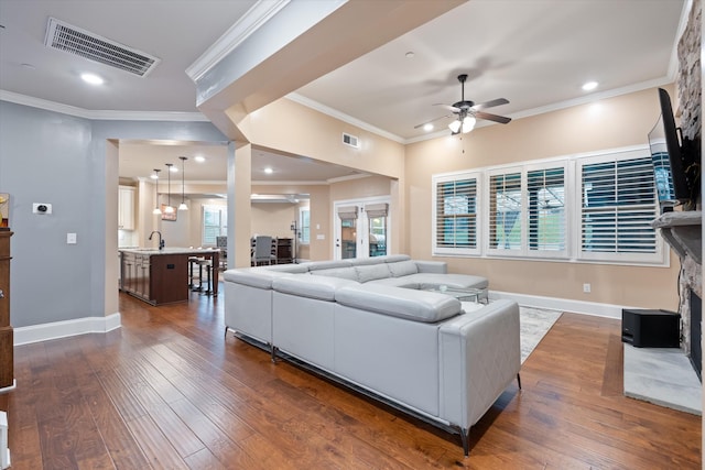 793 Alameda Ave, Nolensville, TN 37135 - living room featuring ceiling fan, crown molding, dark wood finished floors, a fireplace, and recessed lighting