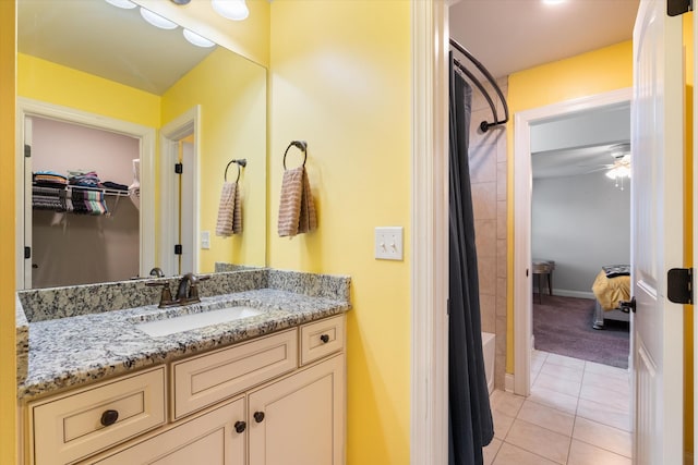 793 Alameda Ave, Nolensville, TN 37135 - bathroom with tile patterned floors, vanity, shower / bath combination with curtain, ceiling fan, and baseboards