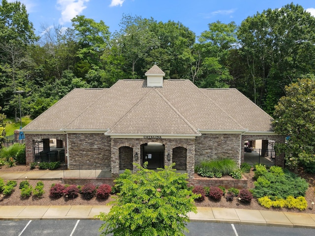 793 Alameda Ave, Nolensville, TN 37135 - view of front facade featuring roof with shingles, uncovered parking, and brick siding