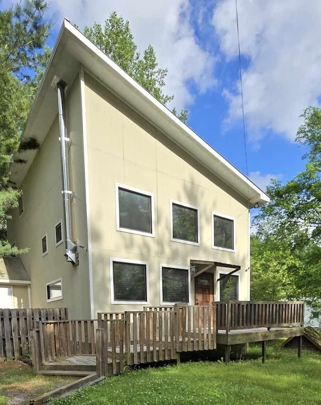 8478 Murfreesboro Hwy, Manchester, TN 37355 - back of property with a wooden deck and stucco siding