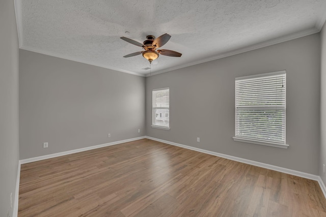 1033 Park Run Dr, Franklin, TN 37067 - unfurnished room with ceiling fan, a textured ceiling, wood finished floors, and crown molding