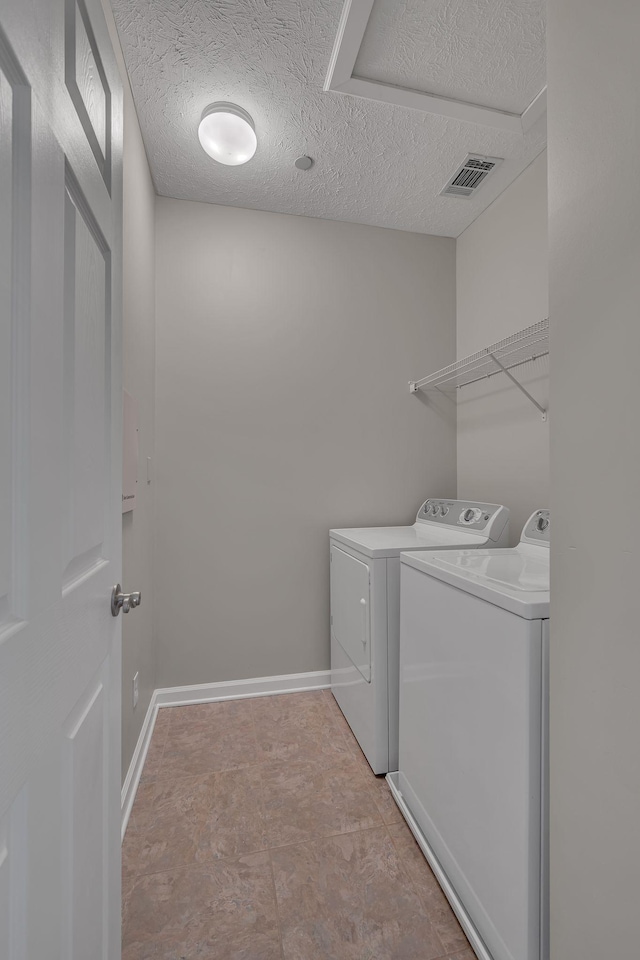 1033 Park Run Dr, Franklin, TN 37067 - washroom featuring washer and dryer and a textured ceiling