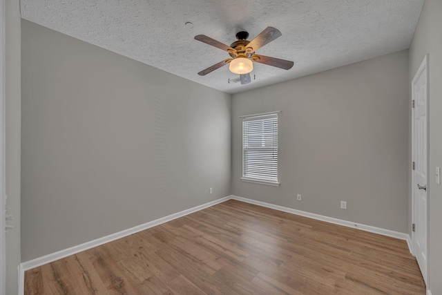 1033 Park Run Dr, Franklin, TN 37067 - unfurnished room featuring light wood-style floors, a ceiling fan, and a textured ceiling