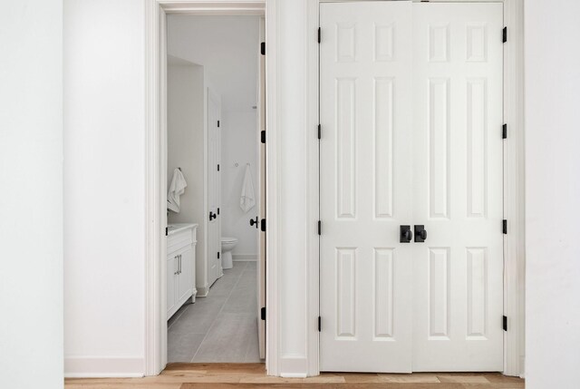 322 Starling Ln, Franklin, TN 37064 - corridor featuring light tile patterned flooring and baseboards