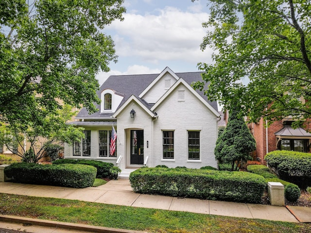 322 Starling Ln, Franklin, TN 37064 - french country style house with brick siding and a shingled roof