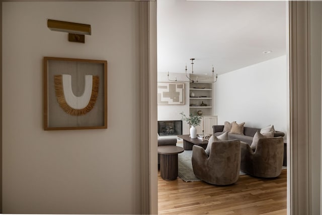 322 Starling Ln, Franklin, TN 37064 - living area featuring wood finished floors and a chandelier