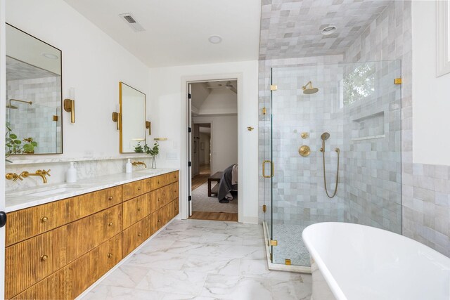 322 Starling Ln, Franklin, TN 37064 - full bathroom with a freestanding tub, a shower stall, double vanity, and marble finish floors