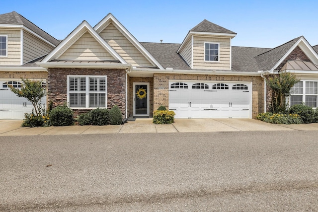395 Devon Chase Hl Unit 5502, Gallatin, TN 37066 - multi unit property featuring roof with shingles, driveway, a garage, and brick siding