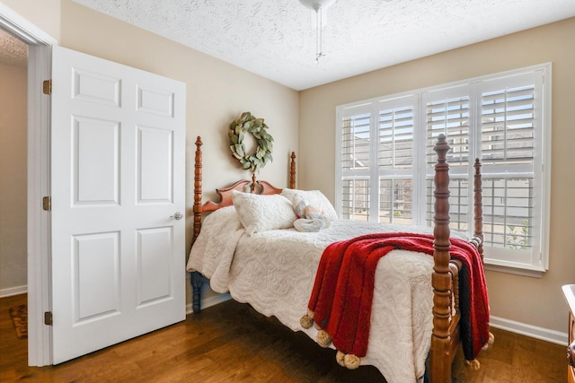 395 Devon Chase Hl Unit 5502, Gallatin, TN 37066 - bedroom featuring multiple windows, wood finished floors, and a textured ceiling