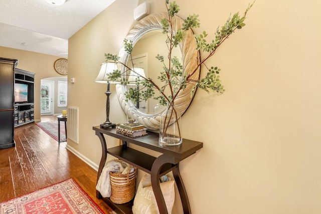 395 Devon Chase Hl Unit 5502, Gallatin, TN 37066 - hallway with hardwood / wood-style flooring and arched walkways
