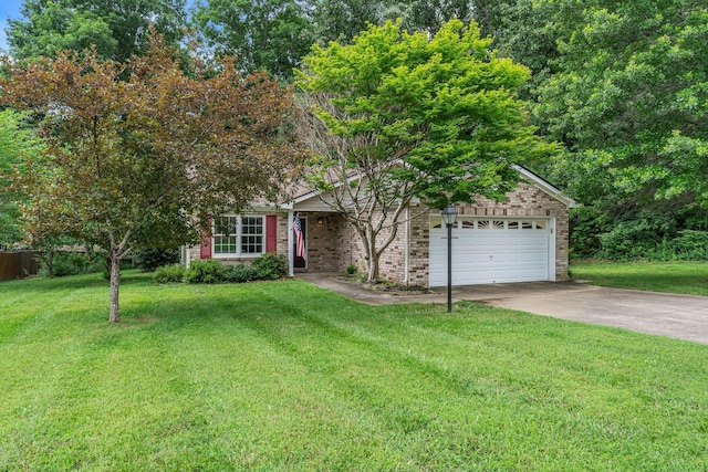 7352 Hidden Lake Cir, Fairview, TN 37062 - view of front of property featuring concrete driveway, a garage, a front lawn, and brick siding