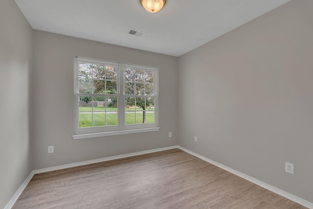 7352 Hidden Lake Cir, Fairview, TN 37062 - unfurnished room featuring plenty of natural light and wood finished floors
