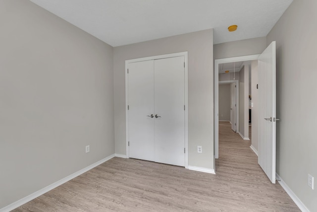7352 Hidden Lake Cir, Fairview, TN 37062 - unfurnished bedroom with light wood-type flooring and a closet