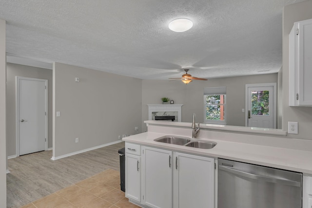 7352 Hidden Lake Cir, Fairview, TN 37062 - kitchen featuring dishwasher, ceiling fan, a textured ceiling, light countertops, and white cabinets