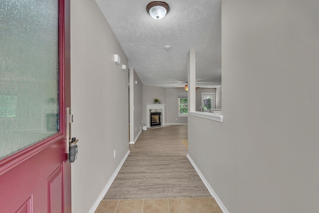 7352 Hidden Lake Cir, Fairview, TN 37062 - hall with a textured ceiling and light tile patterned flooring