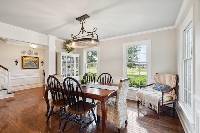 5013 Baker Rd, Murfreesboro, TN 37129 - dining room featuring ornamental molding, wood-type flooring, a decorative wall, wainscoting, and stairway