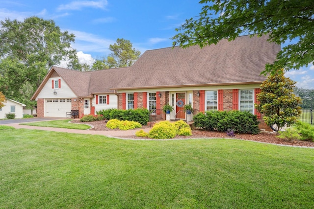 5013 Baker Rd, Murfreesboro, TN 37129 - view of front facade with brick siding, a front lawn, asphalt driveway, and roof with shingles