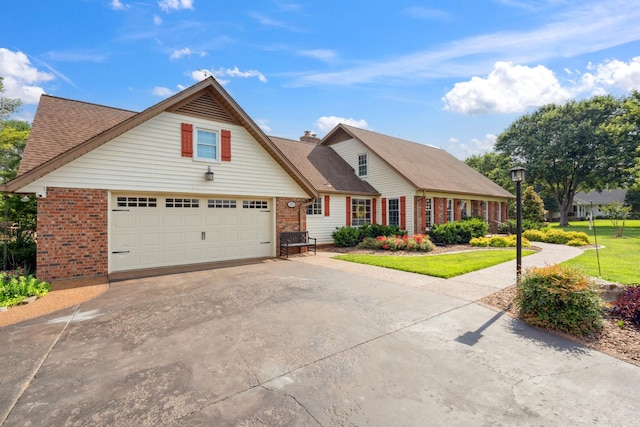 5013 Baker Rd, Murfreesboro, TN 37129 - traditional-style house with brick siding, concrete driveway, a front lawn, and a shingled roof