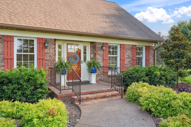 5013 Baker Rd, Murfreesboro, TN 37129 - view of exterior entry featuring roof with shingles and brick siding