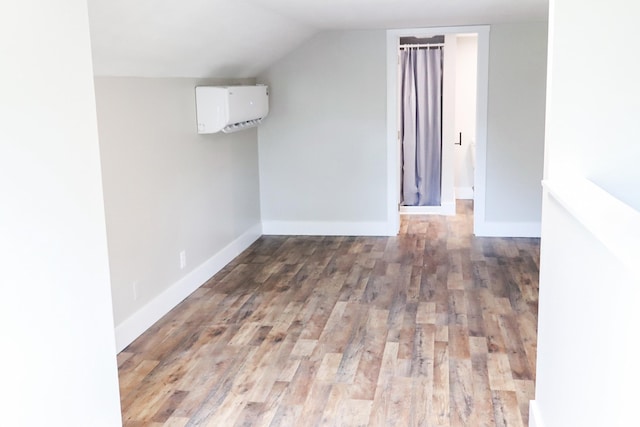 413 E Main St, Waverly, TN 37185 - additional living space featuring wood finished floors and vaulted ceiling