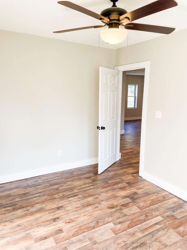 413 E Main St, Waverly, TN 37185 - unfurnished room featuring light wood finished floors and a ceiling fan