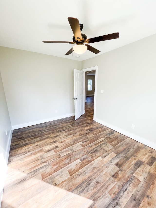 413 E Main St, Waverly, TN 37185 - spare room with wood finished floors and ceiling fan