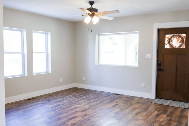 413 E Main St, Waverly, TN 37185 - foyer entrance featuring dark wood-type flooring and a ceiling fan
