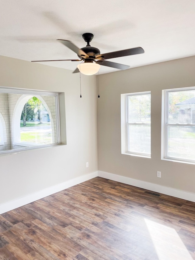 413 E Main St, Waverly, TN 37185 - spare room with a ceiling fan and wood finished floors