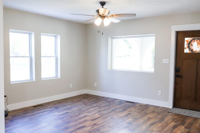 413 E Main St, Waverly, TN 37185 - entrance foyer featuring plenty of natural light, ceiling fan, and dark wood-style floors