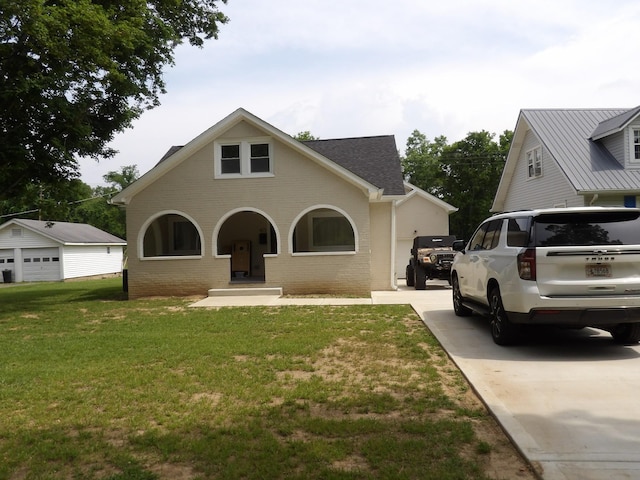 413 E Main St, Waverly, TN 37185 - traditional home with concrete driveway, brick siding, and a front lawn