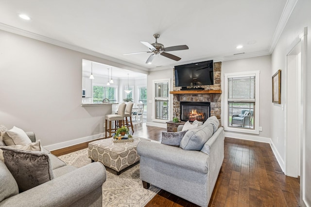 146 Island Way, Winchester, TN 37398 - living area with crown molding, ceiling fan, a stone fireplace, dark wood-style flooring, and recessed lighting