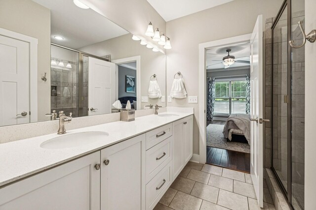 146 Island Way, Winchester, TN 37398 - ensuite bathroom featuring double vanity, a shower stall, tile patterned flooring, ceiling fan, and recessed lighting
