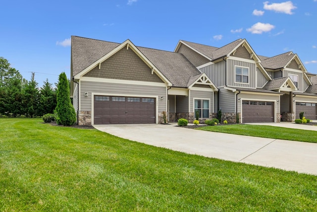 146 Island Way, Winchester, TN 37398 - craftsman-style home featuring board and batten siding, concrete driveway, a front lawn, and stone siding