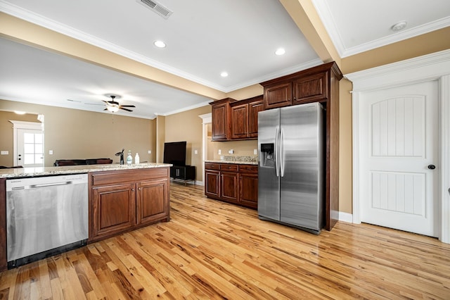 2816 Lightning Bug Dr, Murfreesboro, TN 37129 - kitchen with stainless steel appliances, light wood-style flooring, a ceiling fan, crown molding, and open floor plan
