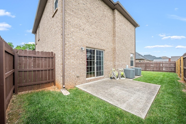 2816 Lightning Bug Dr, Murfreesboro, TN 37129 - rear view of property with brick siding, a patio, and a fenced backyard