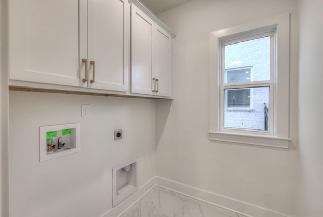 4025 Singing Creek Dr, Franklin, TN 37064 - washroom with cabinet space, electric dryer hookup, marble look tiles, and hookup for a washing machine