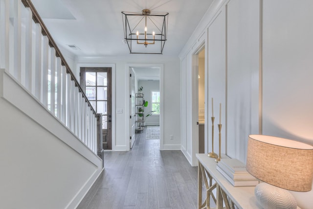 4025 Singing Creek Dr, Franklin, TN 37064 - foyer featuring a chandelier, wood finished floors, and stairs