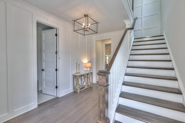 4025 Singing Creek Dr, Franklin, TN 37064 - stairs with wood finished floors and a chandelier