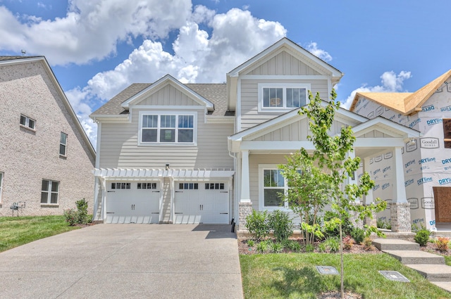 4025 Singing Creek Dr, Franklin, TN 37064 - craftsman-style home featuring board and batten siding, a shingled roof, driveway, and an attached garage