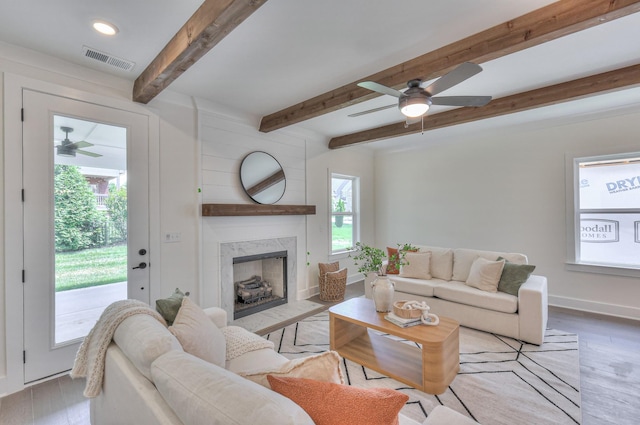4025 Singing Creek Dr, Franklin, TN 37064 - living area featuring a ceiling fan, beamed ceiling, a premium fireplace, wood finished floors, and recessed lighting