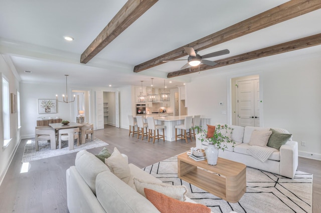4025 Singing Creek Dr, Franklin, TN 37064 - living area featuring a chandelier, light wood-style floors, a ceiling fan, beamed ceiling, and recessed lighting