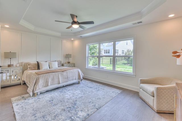 4025 Singing Creek Dr, Franklin, TN 37064 - bedroom featuring a raised ceiling, light wood-style flooring, ceiling fan, and recessed lighting