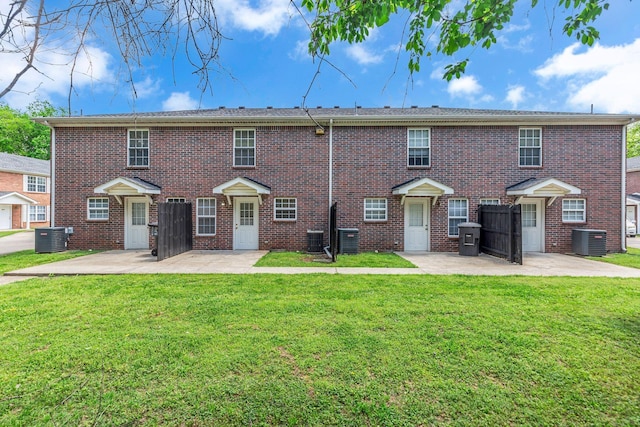 1505 Center Pointe Dr, Murfreesboro, TN 37130 - multi unit property featuring a patio, a front yard, and brick siding